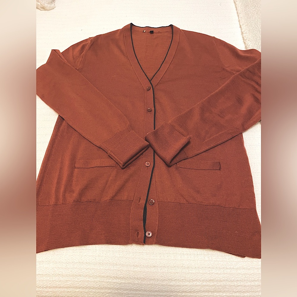 Luxury Designer Rust Cardigan w Navy trim
Worn once